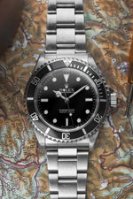 Rolex Submariner ref. 14060m w. box & papers (c. 2006)