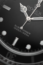 Rolex Submariner ref. 14060m w. box & papers (c. 2006)