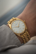 Patek Philippe ref. 2526 in YG w. Bracelet: Retailed by Somazzi (c. 1953)