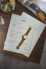 Patek Philippe ref. 2526 in YG w. Bracelet: Retailed by Somazzi (c. 1953)