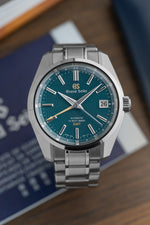 Grand Seiko SBGJ227 “Peacock” | Hi-Beat, GMT (Limited Edition of 700)